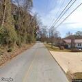 Dead tree blocking lane near Chimney Rock Park
