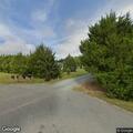 Golf cart shelter fire behind Pikeville home
