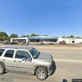 Officer conducts traffic stop at tire shop