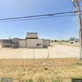 Homeless man sleeping on sidewalk at west Reno