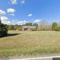 Woman in nightgown possibly having psychiatric episode near highway