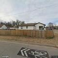 Fire crew checks smoke detector at residence