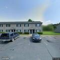 Person suffering from back pain near Colonial Village Drive