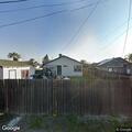 Person experiencing abdominal pain near E Ash Avenue