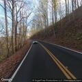 Injury crash with riders down mountain on Calderwood Hwy
