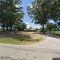 Person with flashlight reported in woods near home