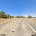 Traffic stop on gray Mercedes van at rest area