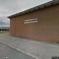 70-year-old woman found unresponsive at school