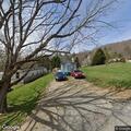 Downed utility line blocking Old Fort Road