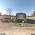 Person prowling and trying door at trailer park home