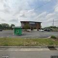 Welfare check on man lying in grass near bank