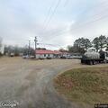Reckless truck towing camper near DJ’s Diner