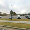 Person experiencing abdominal pain at Pineville Boulevard
