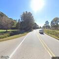 Car with two flat tires on Old Stage Road