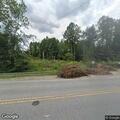 Motorcyclist falls while stopping near I-26