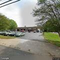 Officer stops gray Mustang at tire shop
