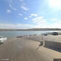 Female injured, likely hyperextended wrist during water sport