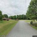 Person experiencing chest pain near 1st Street