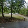 Tree leaning on communication wires reported