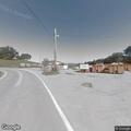 Person experiencing abdominal pain near Jupiter Road