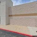 Traffic stop on blue pickup at store parking lot