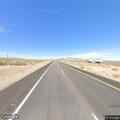 Small brush fire in median on Highway 93