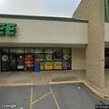 Person experiencing severe headache at Dollar Tree