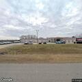 Suspicious vehicle with covered plate at auto shop