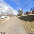 Person experiencing chest pain on White Pine Lane