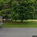 Person with high fever and possible hallucinations in van