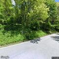 Disabled vehicle on shoulder of Bear Wallow Road