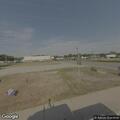 Man found unconscious but breathing on grass outside market