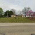 Complaint about neighbors mowing lawn
