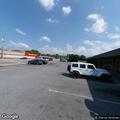 Suspicious parked SUVs near restaurant dumpster