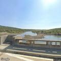 Vehicles doing stunts and fireworks at Fort Gibson Dam