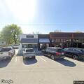 man possibly choking or having a seizure at cafe