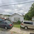 Illegal outdoor burn on Southwest Realty Street