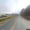 Vehicle overturned in ditch with person trapped