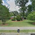Tree down in power lines on North Greensboro Street