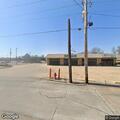 Person falls in medical clinic parking lot at 1001 N 6th St