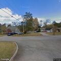 Person experiencing back pain at Ken Hollow Road