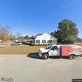Person experiencing breathing problems at senior village