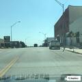 Prisoner fighting with officers at Drumright station