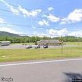Person having seizure in medical center parking lot