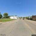 Welfare check on man lying on ground in River Rouge