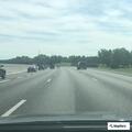 Vehicle with flat tire on I-65 right shoulder