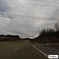 Person with leg pain rescued from hole at highway intersection