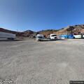 Officer assisting transient at Hoover Dam gas station