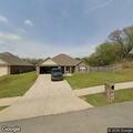 Vehicle left blocking road in front of house
