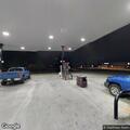Traffic stop involving black pickup in parking lot